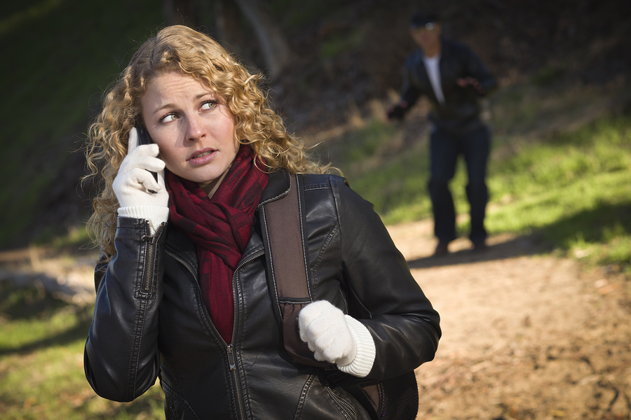 Pretty Young Teen Girl Calling on Cell Phone with Mysterious Str